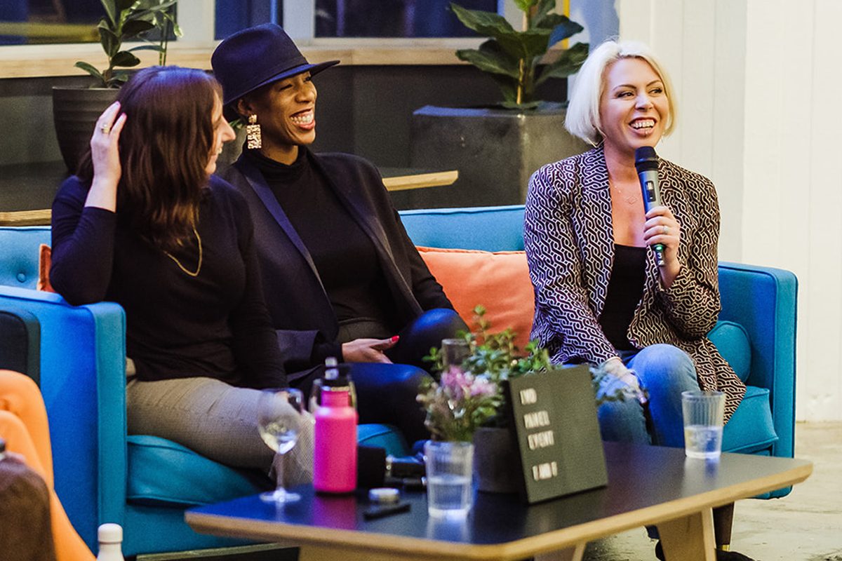 Calandra Balfour speaking on a panel at International Women's Day
